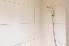 Minimalist 1Br Apartment At Vittoria Residence