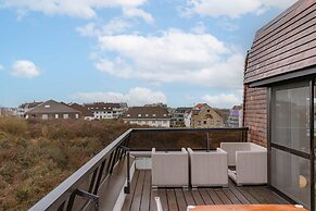 Penthouse on the Dike Bathed in Sunlight