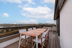 Penthouse on the Dike Bathed in Sunlight