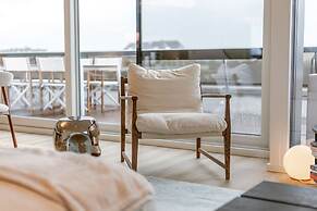 Penthouse on the Dike Bathed in Sunlight