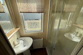 Statichome-sleeps6-lakeview-balcony-parking-petsok