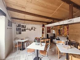 la casa sul tetto rooms & glamping