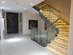 EXECUTIVE HOTELS AND SUITES