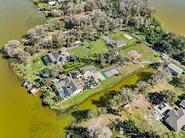 Luxe Waterfront Hideaway w Pool & Pirate Ship Dock