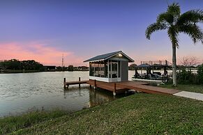 Luxe Waterfront Hideaway w Pool & Pirate Ship Dock
