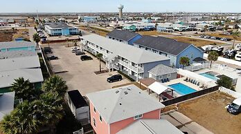 Chic 2BR Coastal Condo Shared Pool Near the Beach Envy the Adventure