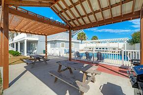 Chic 2BR Coastal Condo Shared Pool Near the Beach Envy the Adventure