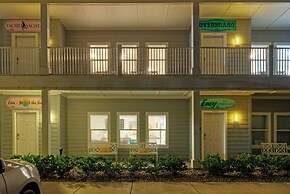 Chic 2BR Coastal Condo Shared Pool Near the Beach Envy the Adventure