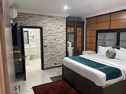 BRICK ROCK HOTEL AND SUITES