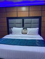 BRICK ROCK HOTEL AND SUITES