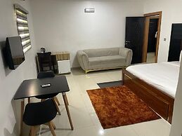 BRICK ROCK HOTEL AND SUITES