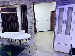 BRICK ROCK HOTEL AND SUITES