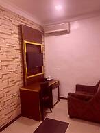 BRICK ROCK HOTEL AND SUITES