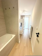 Spacious Bright Apartment Steps From the Beach i