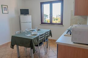 Porto Apartments - La Caletta