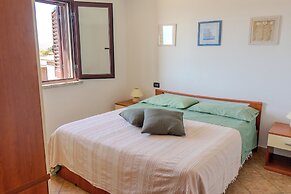 Porto Apartments - La Caletta