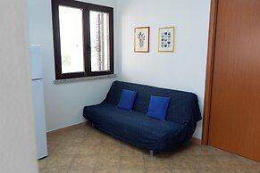 Porto Apartments - La Caletta