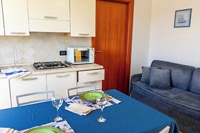 Porto Apartments - La Caletta