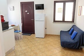 Porto Apartments - La Caletta