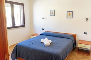 Porto Apartments - La Caletta
