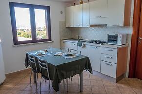 Porto Apartments - La Caletta