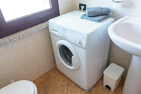 Porto Apartments - La Caletta