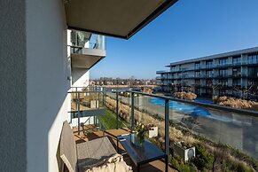 Apartment in Dziwnow With River View & Spa