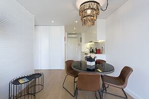 Downtown Bright Balcony Apartment by Vacationy