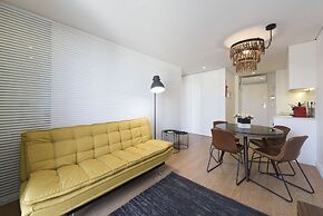 Downtown Bright Balcony Apartment by Vacationy