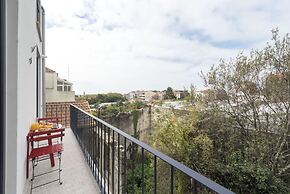 Downtown Bright Balcony Apartment by Vacationy