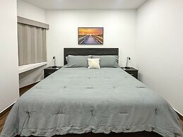 Steps to Sandy Beach Pool Renovated 2BR Condo