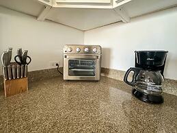 Steps to Sandy Beach Pool Renovated 2BR Condo