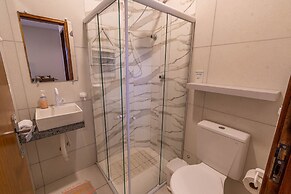 FLATS MAR'BELLA COM VARANDA, 100M PRAIA, PETFRIENDLY E ESTACIONAMENTO