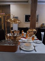 Ice Grand Hotel & Suites