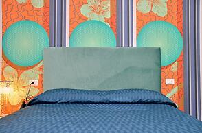 Colourful Suite With Terrace Overlooking the sea