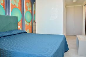 Colourful Suite With Terrace Overlooking the sea