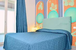 Colourful Suite With Terrace Overlooking the sea