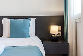 Spacious 1BR Apartment With Resort Access