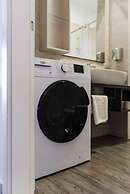 Spacious 1BR Apartment With Resort Access