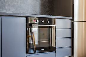 Spacious 1BR Apartment With Resort Access