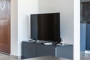 Spacious 1BR Apartment With Resort Access