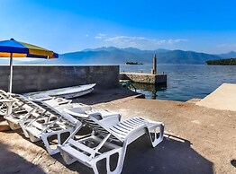 Beachfront Escape Steps From the Crystal-clear Sea