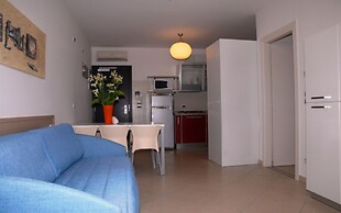 Bright Apartment Steps From the sea