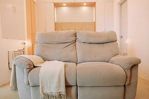 A Warm & Cozy City Studio