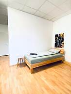 Stylish Shared 3-Bedroom Stay Near City