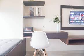 Homey Simply Studio Room At Pollux Chadstone Apartment