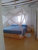 Four shells apartments diani