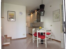 Spacious Apartment With Terrace and Pool in Bibione