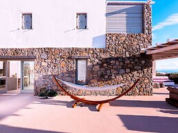 Kounoupas Complex by Mykonos Rocks