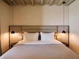 Kounoupas Complex by Mykonos Rocks